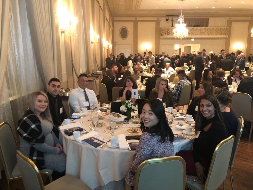 Credico team members enjoying the Volunteers of America Leadership Luncheon