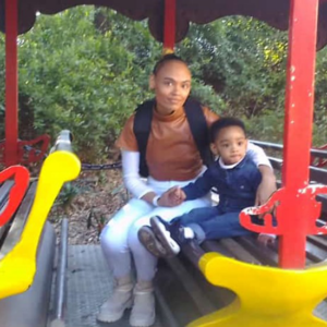 A mother rides the train with her son at Credico South Africa's Christmas In July outing at the Gold Reef City Theme Park