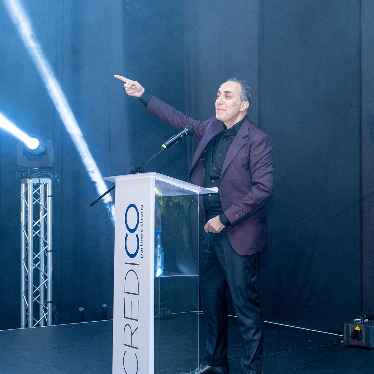 Credico's Chairman and founder, Antoine Nohra, addresses the audience from a podium on stage at Credico South Africa's 2023 Awards Gala at Sun City Resort.