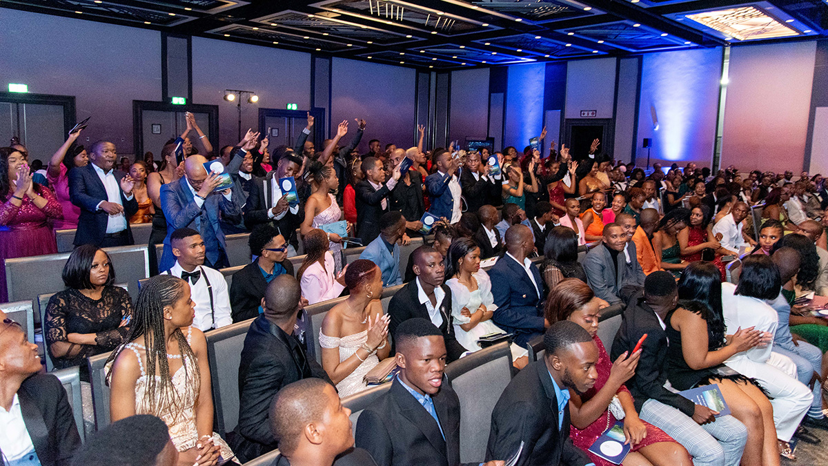 The crowd rises in excited applause at Credico South Africa's 2023 Awards Gala at Sun City Resort