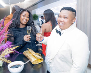 Smiling attendees at the champagne reception before the South Africa Awards Gala in March 2025